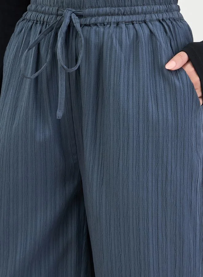 Styli Women Grey Textured Wide Leg Trousers